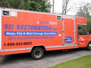 Water Damage Restoration Box Truck Parked At Residential Job Location