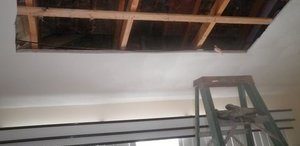 Water and Mold Damage Restoration On Ceiling In Progress